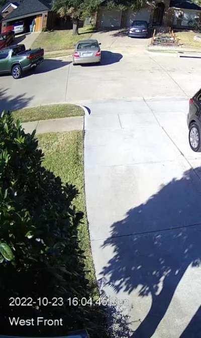 Second time crazy neighbor just flies out of her driveway in reverse almost hitting me.