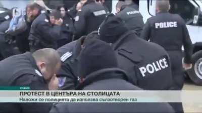 Bulgarian police uses pepper spray on protestors in front of the parliament. They forget to take the wind into account.