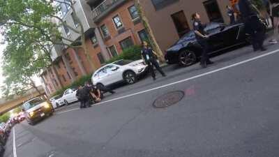 The person who captured this video is trying to get it to the cyclist getting punched in the head. Happened in Brooklyn