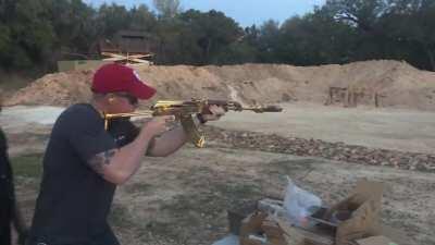 I got to shoot a suppressed, gold plated, full auto AK-47 yesterday at Silence in the Capitol yesterday. It was a good day.