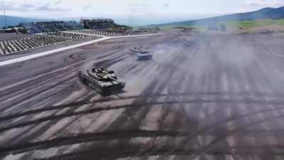 Type 10 MBT's during a live fire demonstration. Video by Defence Blog