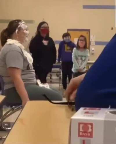 Teacher tries to raise money for the new library... ends up with a broken nose and a concussion. 💀