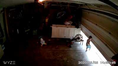 2 Year Old Takes a Garage Door Ride