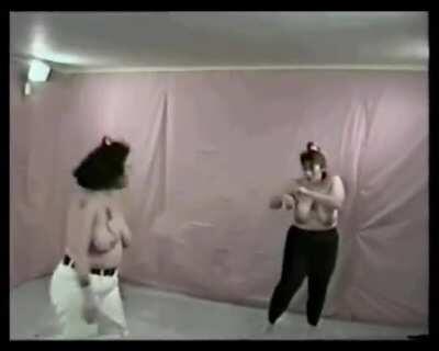 Heavyweights Battle Over Husband