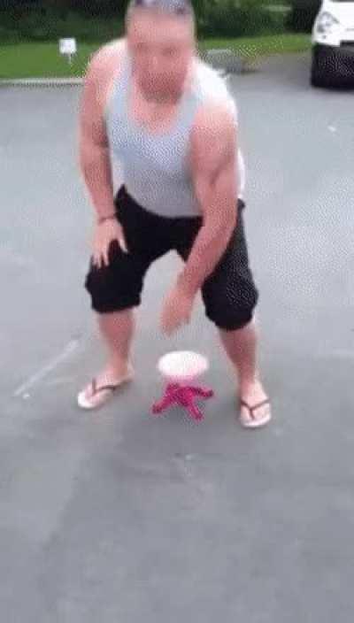 Sitting on a plastic child stool