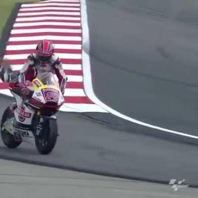 A man falls off falls off his bike