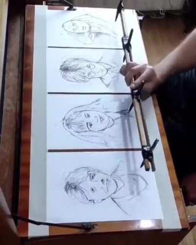 A person draws 4 pictures at once