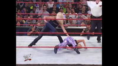 Torrie Wilson Defeats Trish Stratus in a SPANKING match