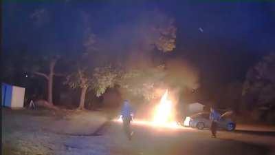Motorcyclist transporting gasoline in a backpack bursts into flames after being tasered by police.