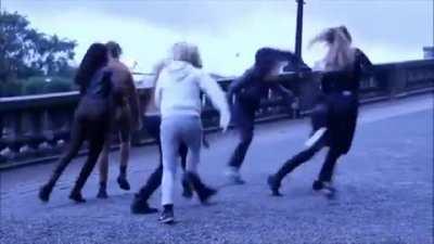 Swedish feminists protesting against statues of men riding horses.