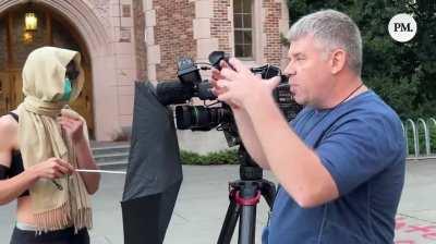 Activist woman shares her love of Rick and Morty with man attempting to capture footage of protest (University of Washington Campus)
