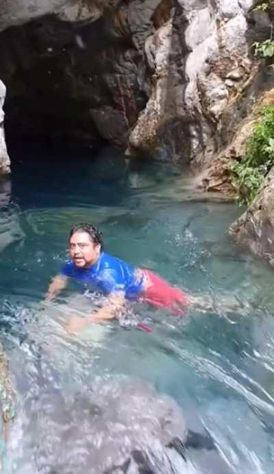Guy swimming where he shouldn't