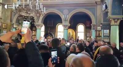  In the former UOC MP church in Lviv, the national anthem of Ukraine is played.