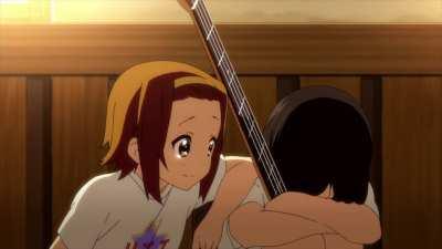 Everyone talks about the Tenshi song being the saddest part, but this scene came out of nowhere and punched you in the gut realizing the show is almost over [K-On!!]
