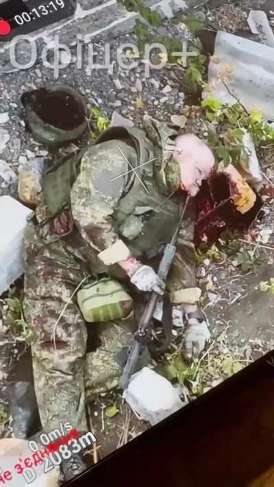 A russian is found who has taken a certain decision into his own hands, and put his ak to the head. Unknown time and place.