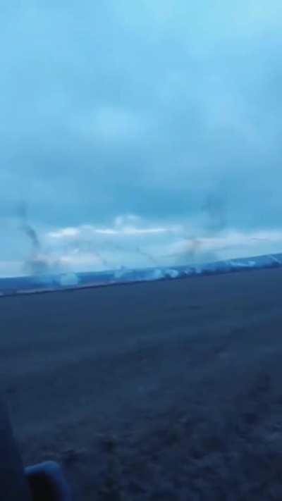 Ukrainian chopper active, Ukrainian AA rolls past recording from the distance