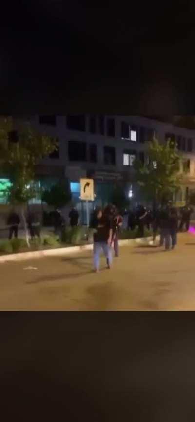 Protestor shot point blank by tear gas canister