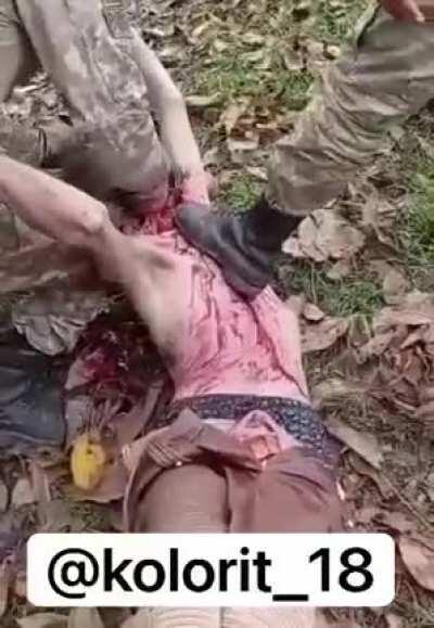 Azerbaijani soldier decapitates captured Armenian alive.