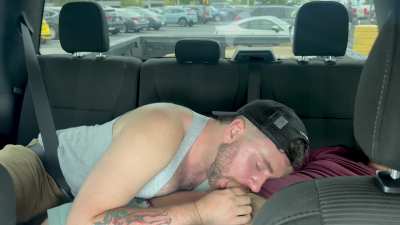 Feeding him a load in the parking lot