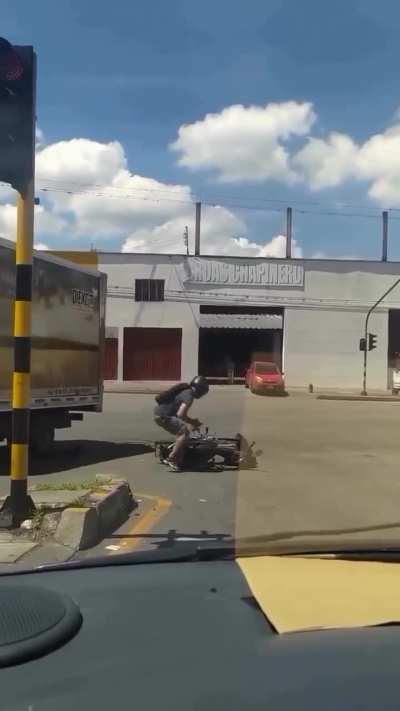 Kicking a car when riding a bike