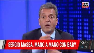 Massa defendiendo a Melconian.