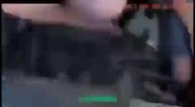 Overpass sign falls and hits a car