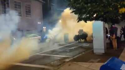Abolish ICE protesters try to push police and federal agents with umbrellas - Portland 18th September