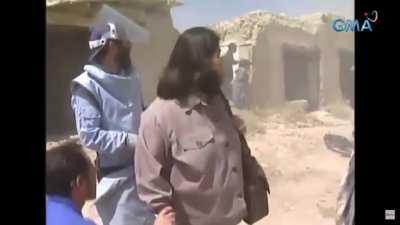 Ambulance carrying the body of a deceased deminer gets blown up by a landmine during a documentary in Afghanistan