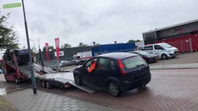 How to load a car onto a truck 101