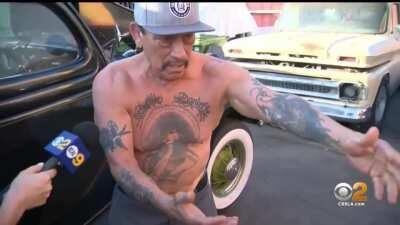 Surveillance video shows Machete actor Danny Trejo running to save a trapped child from an overturned SUV after a car T-boned while running a red light