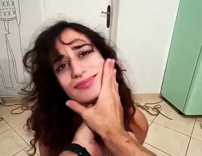 Testing her pain tolerance