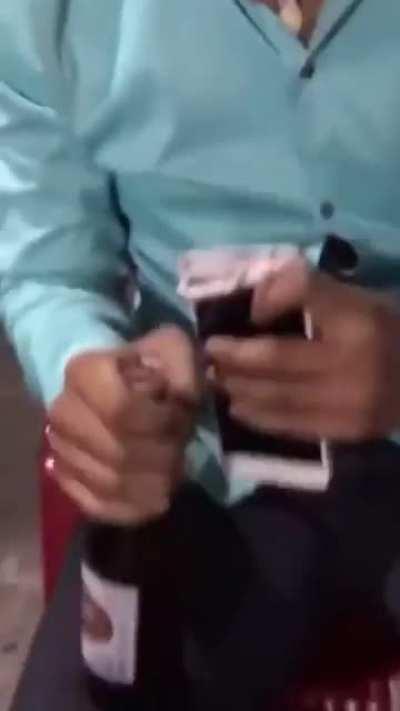 Trying to open beer bottles with an iPhone...