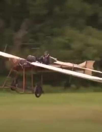 Person rebuilds plane model from 1910 and skillfully flies is at low altitude