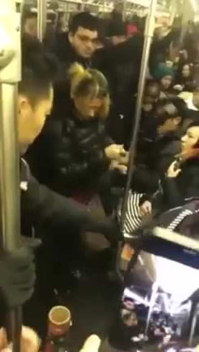 Racist Karen attacks woman on the subway