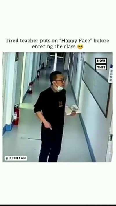 Exhausted teacher puts on a happy face before entering class