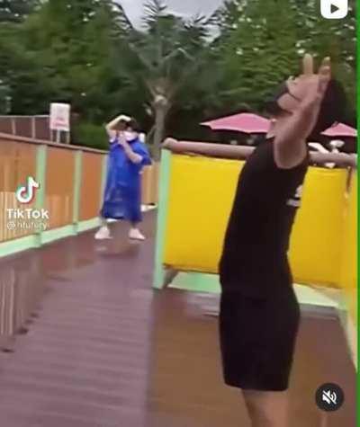 Dude gets nailed by water (not my video)