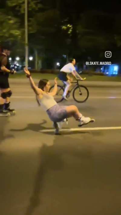 This lady rollerblading while balancing on one wheel.