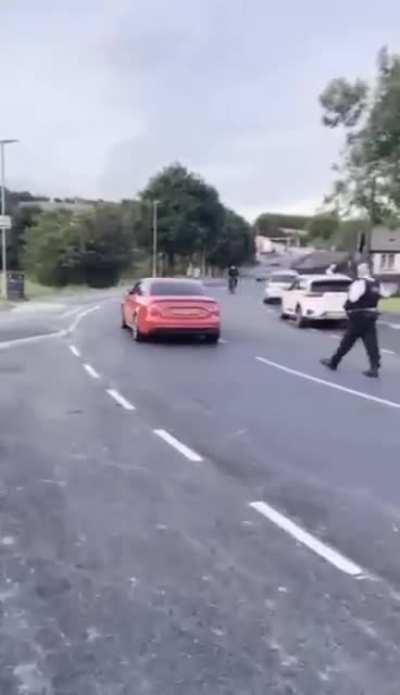 Man with a petrol engine fitted to a bicycle vs the police
