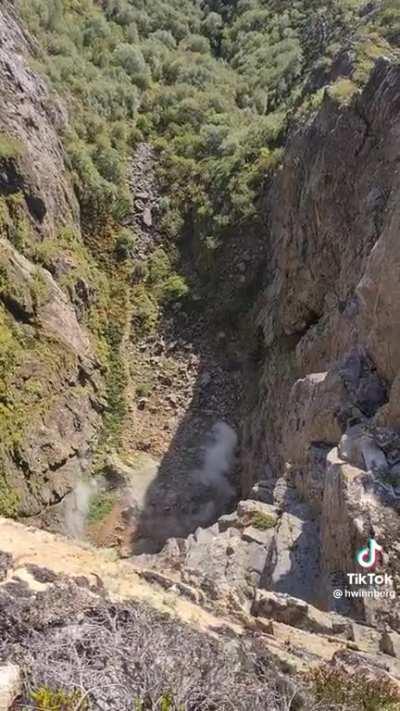 [request] What distance did the boulder fall from its initial height?