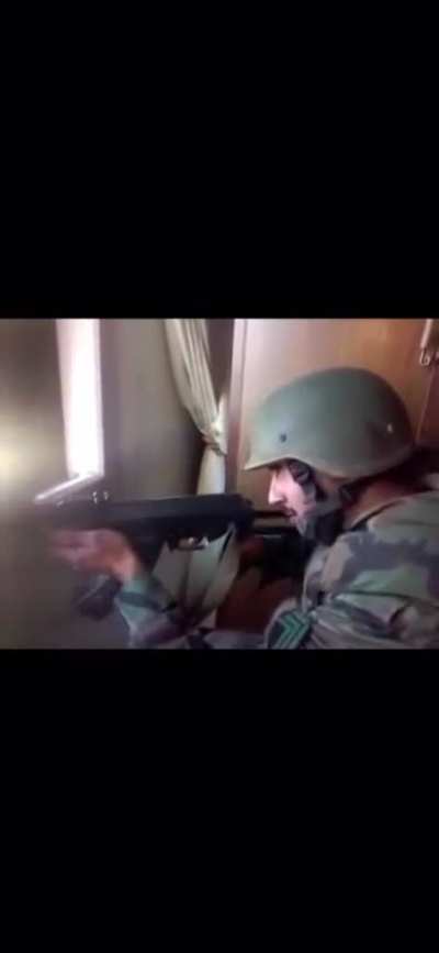 SAA soldier takes a round to the face while fighting in a apartment building