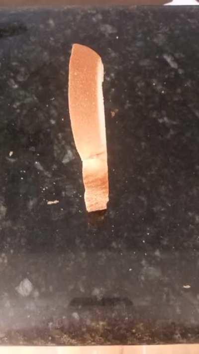 a piece of bread falling over on beat (i swear i don't drop it off beat)