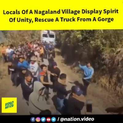 Villagers of Nagaland, India came out to help a truck that disbalanced and rolled down a cliff.