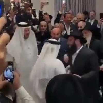 Arabs and Jews dancing together and being total bros at a Jewish wedding in the UAE