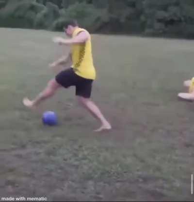 Playing football with a bowling ball