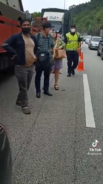 Rolls-Royce crushed between trucks