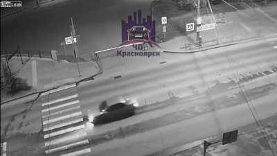 Pedestrian killed when running across the red light.