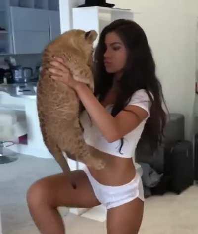 WCGW Picking up this baby lion.