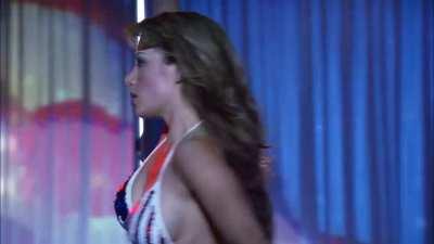 Erica Durance stripping in 