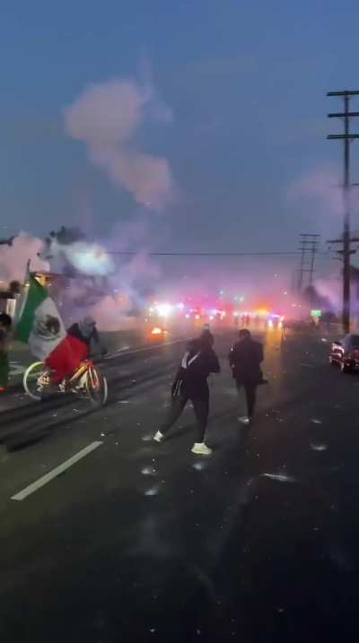 Law enforcement firing non lethal rounds at protesters Paramount CA