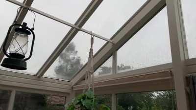 Heavy rain on the conservatory